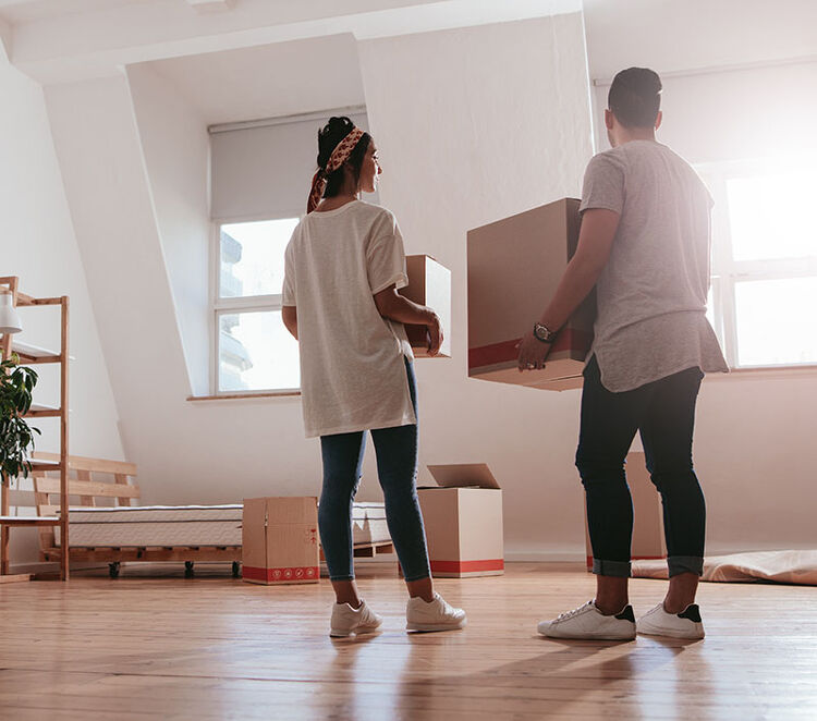 Couple moving into an empty home